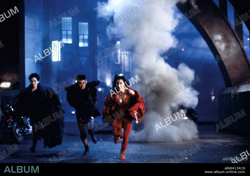 ANITA MUI, MAGGIE CHEUNG and MICHELLE YEOH in THE HEROIC TRIO, 1993 (DUNG FONG SAM HAP), directed by JOHNNIE TO. Copyright China Entertainment Films Production.