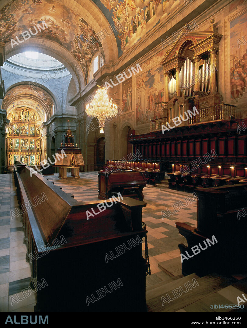 Royal Seat of San Lorenzo de El Escorial. 16th century. Choir stalls by Giuseppe Flecha. The frescoes of the ceiling are by Luca Cambiasi (1527-1585). San Lorenzo de El Escorial. Spain.