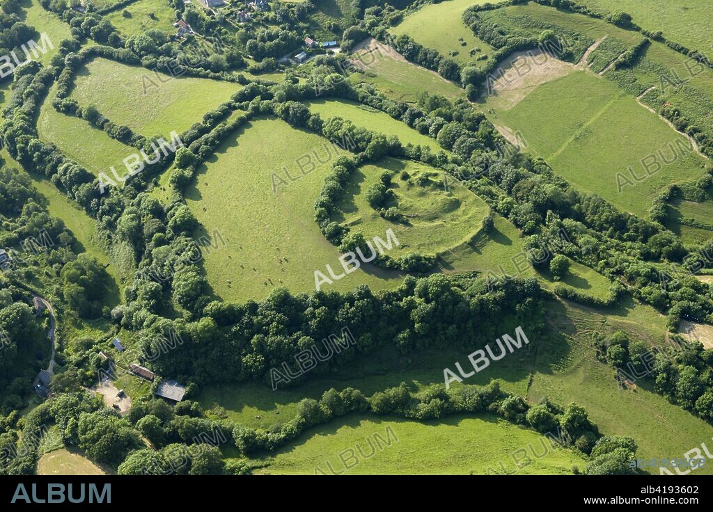 Earthwork remains of a motte and bailey castle near Powerstock, Dorset, 2014.