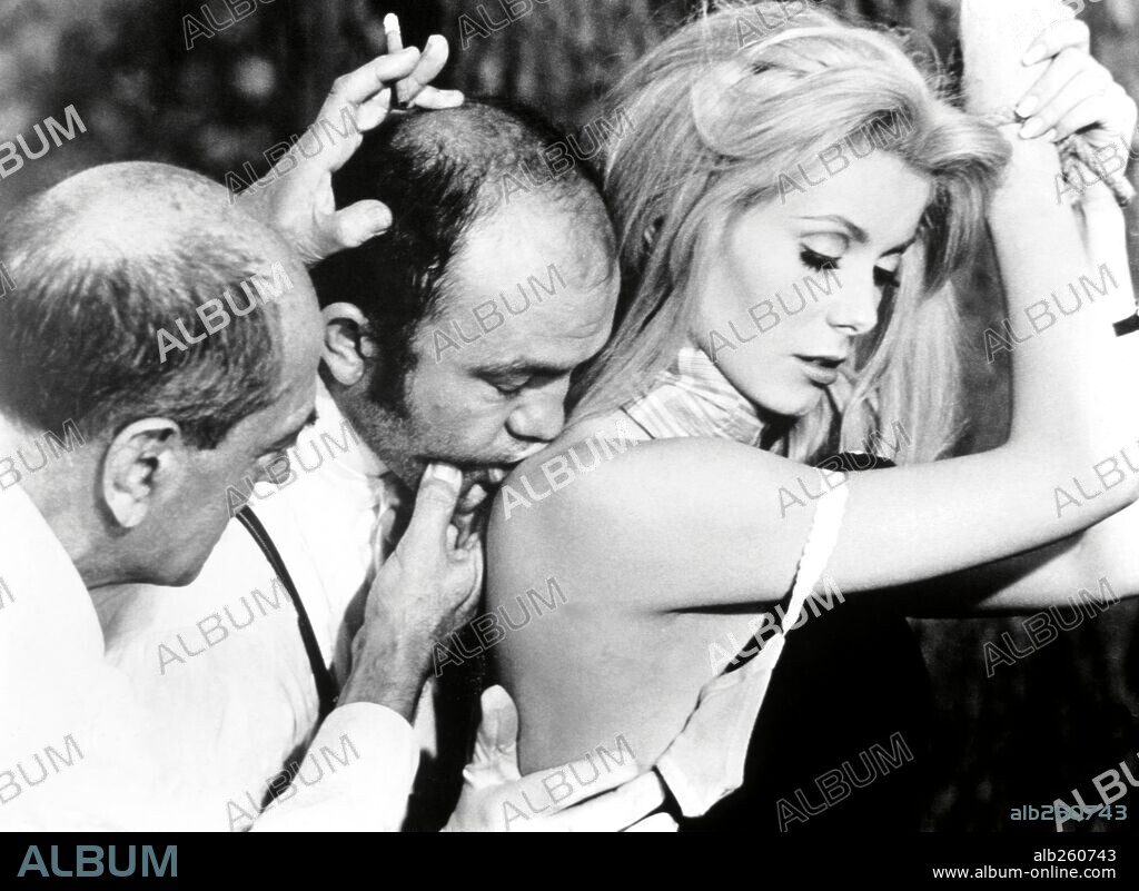 LUIS BUNUEL and Catherine Dorléac. CATHERINE DENEUVE and LUIS BUÑUEL in BELLE DE JOUR, 1967, directed by LUIS BUÑUEL. Copyright PARIS FILM/FIVE FILM.
