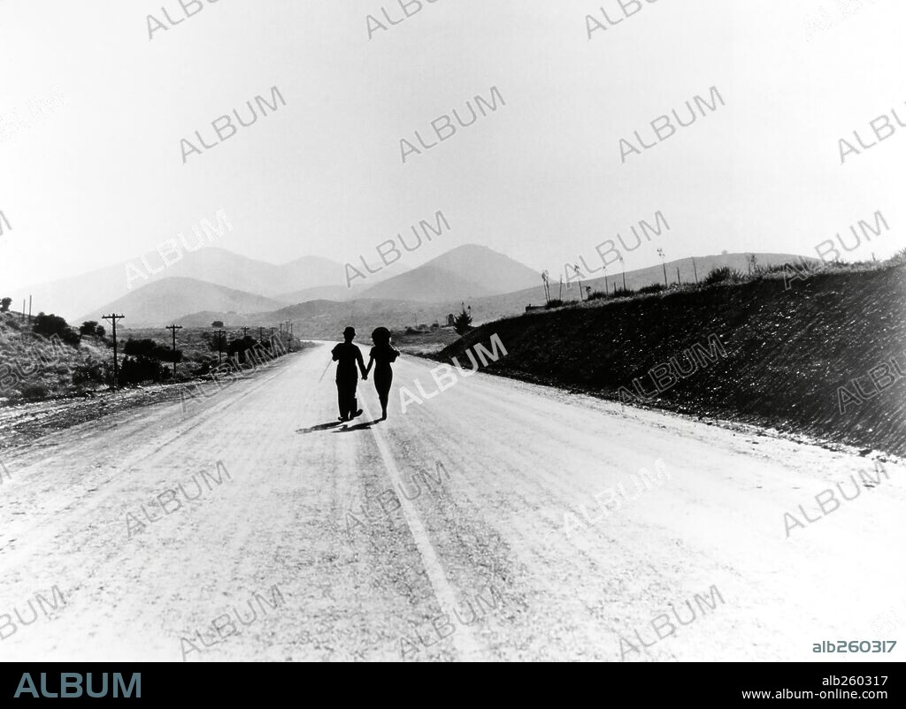 CHARLIE CHAPLIN und PAULETTE GODDARD in MODERN TIMES, 1936, unter der Regie von CHARLES CHAPLIN. Copyright CHAPLIN/UNITED ARTISTS.
