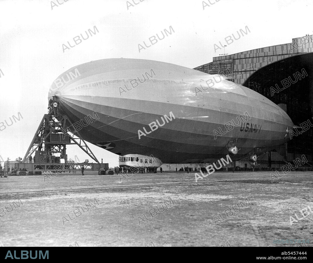 Portable mooring mast taking the Los Angeles from her hangar as she leaves to "defend"the Panama CanalLakehurst, N.J. The U.S.S. Los Angeles, Navy Dirigible attached to the new portable mooring mast as it is taken from its hangar at Lakehurst to take off for  Panama.The Los Angeles will defend" the Panama Canal against the attacking forces" in the maneuvers of the combined -fleet. In the Caribbean sea. April 2, 1931. (Photo by International Newsreel Photo).