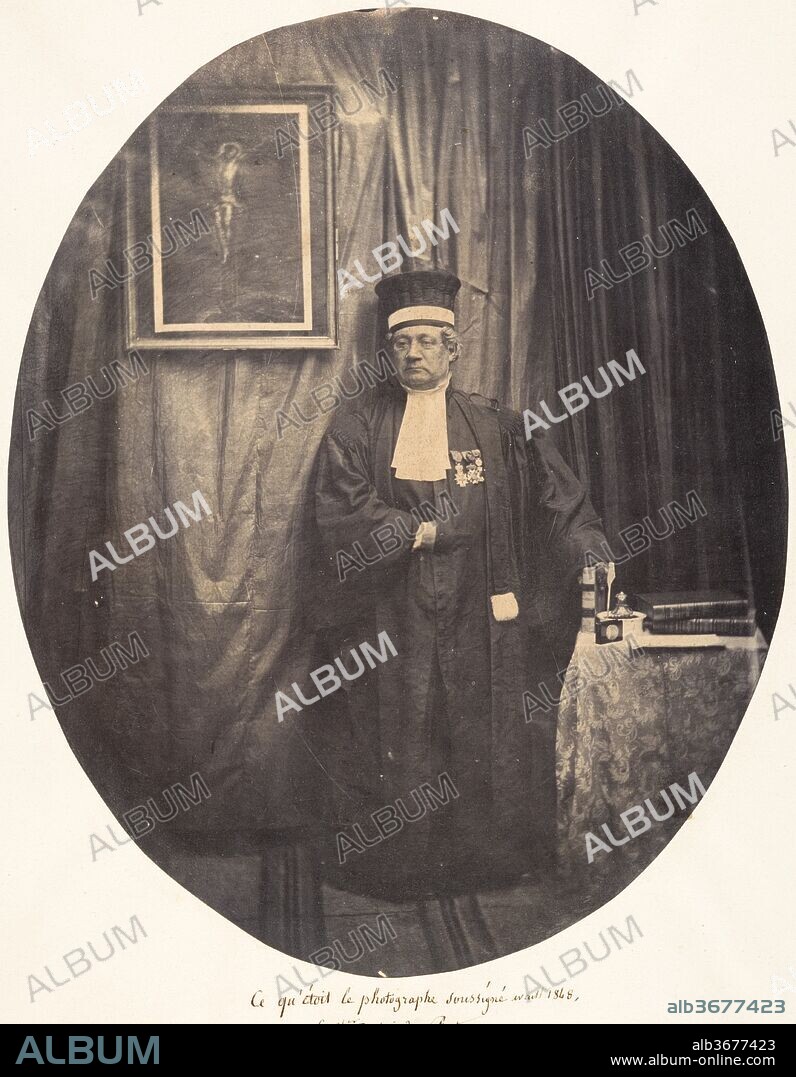 LOUIS-PIERRE-THÉOPHILE DUBOIS DE NEHAUT. The Undersigned Photographer as He Was Before 1848. Artist: Louis-Pierre-Théophile Dubois de Nehaut (French, active Belgium, 1799-1872). Dimensions: Image: 9 13/16 × 7 15/16 in. (25 × 20.1 cm). Date: 1854-56.
Although Dubois de Nehaut is best known for his early achievements in photographic reportage, he also produced a series of carefully posed portraits of his family and friends. Here the amateur photographer dons his judge's robes, standing nobly in front of a makeshift backdrop. Dubois de Nehaut served as magistrate in Lille before relocating to Brussels after the revolutions of 1848. In 1850 the king of Belgium appointed him a knight of the Order of Leopold for helping to maintain the law and stop war from spilling across the border. The medals splayed across his chest in this self-portrait shine with their wearer's pride.