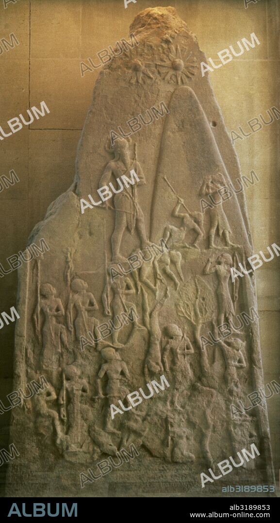Victory stele of Naram-Sin, King of Akkad. It celebrates the triumph of King Naram-Sin over a mountain people, over Satun, King of the Lullubi. The Akkadian army is climbing the steep slopes of the Zagros Mountains. Mesopotamia. Sipar. Akkadian period, c. 2250 BC. Louvre Museum. Paris, France.