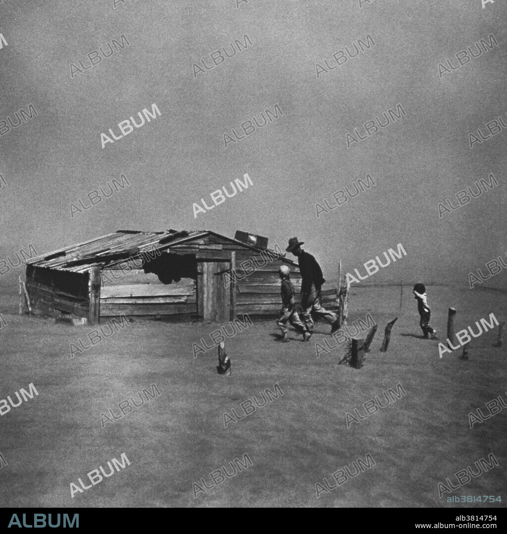 Dust Storm. Farmer Arthur Coble and his two sons walking in a dust storm, Cimarron County, Oklahoma, April 1936. Photo by Arthur Rothstein, FSA, entitled "Fleeing a Dust Storm". The three-year-old fleeing the dust, Darrel Coble, was later interviewed by author Bill Ganzel in 1977 along with others appearing in early photographs from the FSA.
