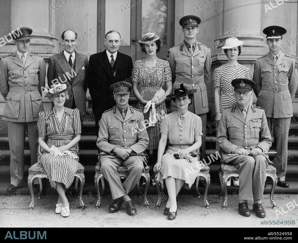 Official group at ***** Lady Duggan, Duke & Duggan at ***** Capt. M. T. Fairbairn A. D. C. to Sir Winston Duggan, Angus McLoughlin, Lt. Bob E. J. de C. Boys, Miss Eileen Philips, Brig Schreiber, Miss Lisle Johnson private secretary to Lady Duggan, Capt. Alexander Ramsay. February 01, 1945.