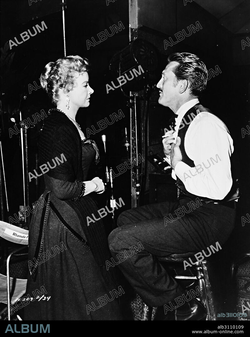 JO VAN FLEET and KIRK DOUGLAS in GUNFIGHT AT THE O. K. CORRAL, 1957, directed by JOHN STURGES. Copyright PARAMOUNT PICTURES.