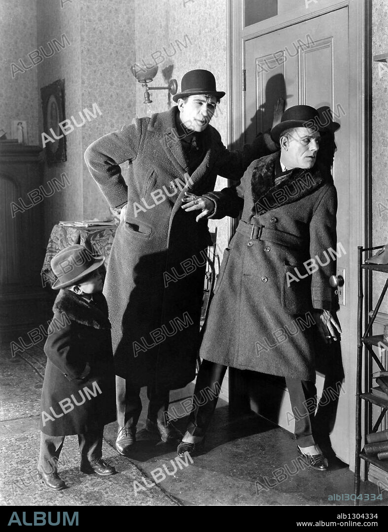 HARRY EARLES, LON CHANEY and VICTOR McLAGLEN in THE UNHOLY THREE, 1925, directed by TOD BROWNING. Copyright M.G.M.