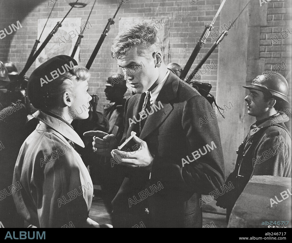 ETCHIKA CHOUREAU and TAB HUNTER in WITH YOU IN MY ARMS, 1958 (LAFAYETTE ESCADRILLE), directed by WILLIAM A. WELLMAN. Copyright WARNER BROTHERS.