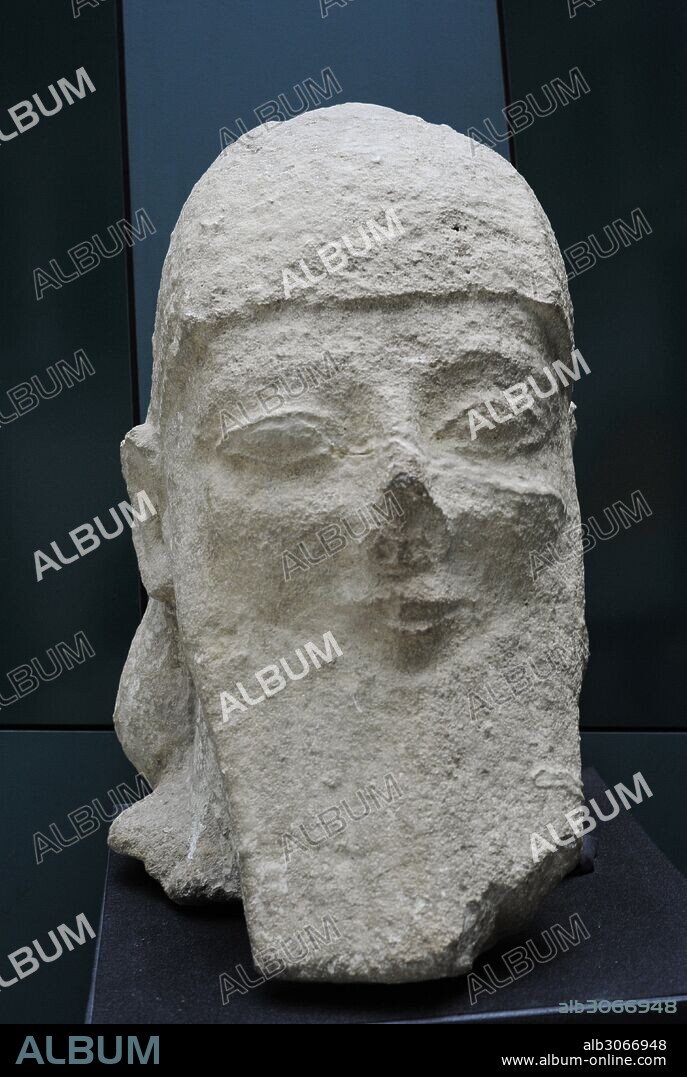 Colossal male head with square beard in Assyrian fashion, wearing pointed helmet. Limestone. 560-540 BC. From Kition, Cyprus. Museum of the Mediterranean and Near Eastern Antiquities. Stockholm, Sweden.
