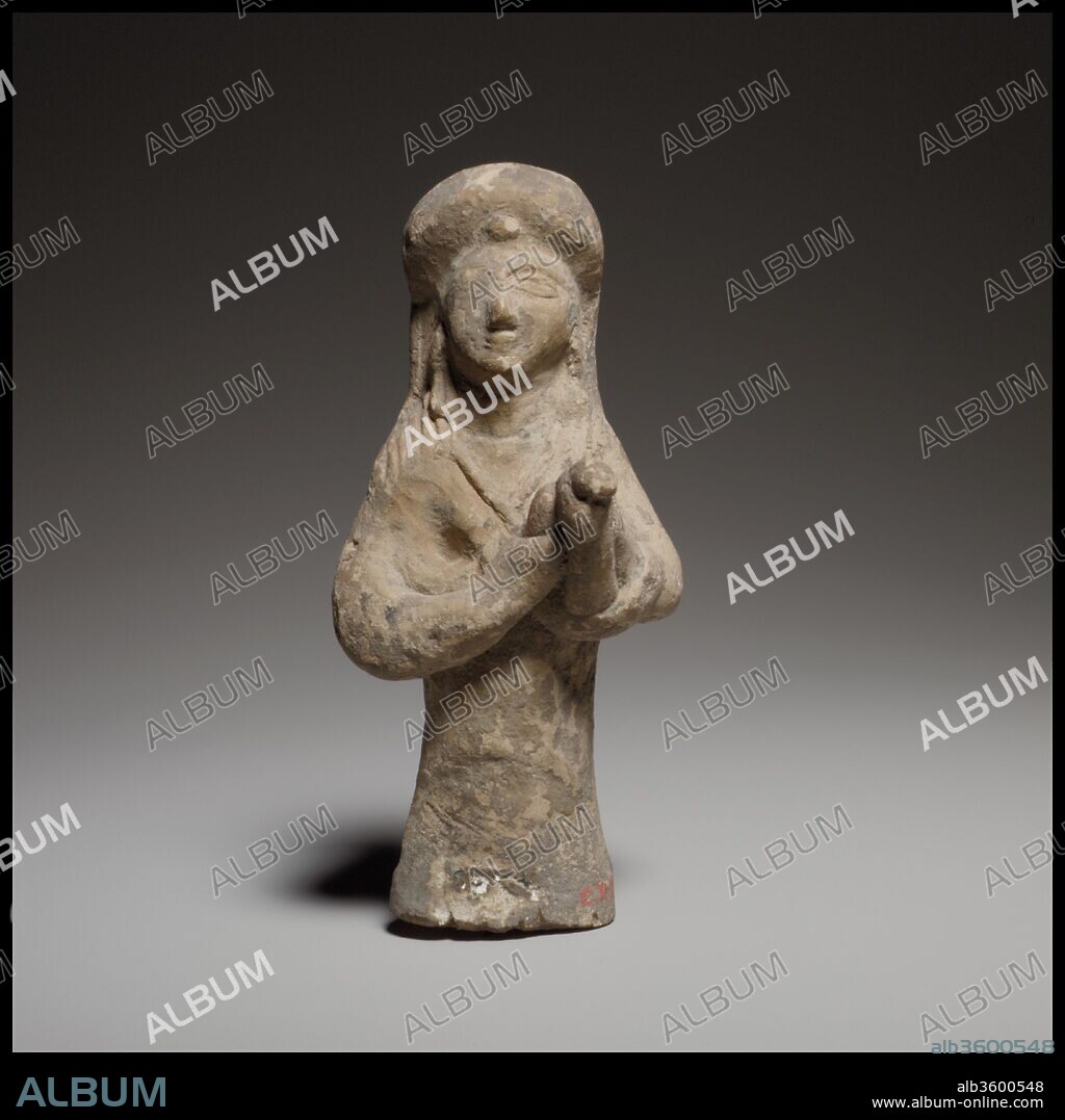 Standing female lyre player. Culture: Cypriot. Dimensions: H. 4 1/4 in. (10.8 cm). Date: ca. 600-480 B.C..
The figurine is mold-made and solid. It may have been cut across the lower body. Her arms, which were added by hand, curve forward to hold a lyre, of which only the lower part is preserved.