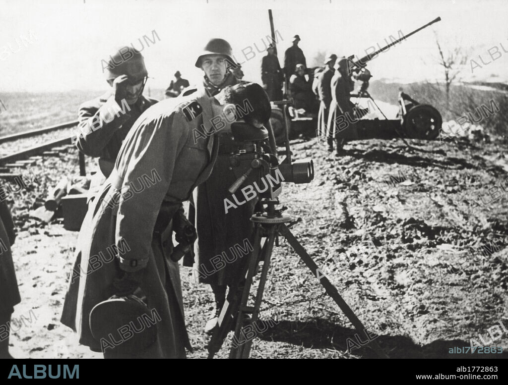 Istvan Horthy during an anti-aircraft drill. Hungarian Vice-Regent Istvan Horthy von Nagybanya uses a telemeter during an anti-aircraft drill. Hungary, November 1941.