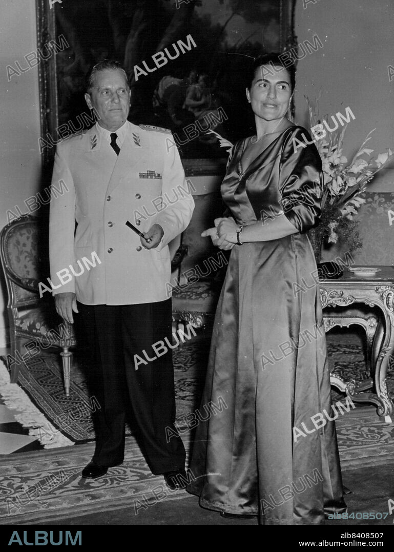 Eden Visits The Titos -- Marshal Tito and Yugoslavia's new first lady, 28-year-old Jovanka Broz, photographed at the state reception for Mr. Eden.Mr. Anthony Eden, British foreign secretary, who is visiting Yugoslavia for a week, attended a reception Thursday given in his honour by Marshal Tito and his new third wife, Mrs. Jovanka Broz. It was first public appearance as the Marshal's wife. September 20, 1952. (Photo by Paul Popper, Paul Popper Ltd.).
