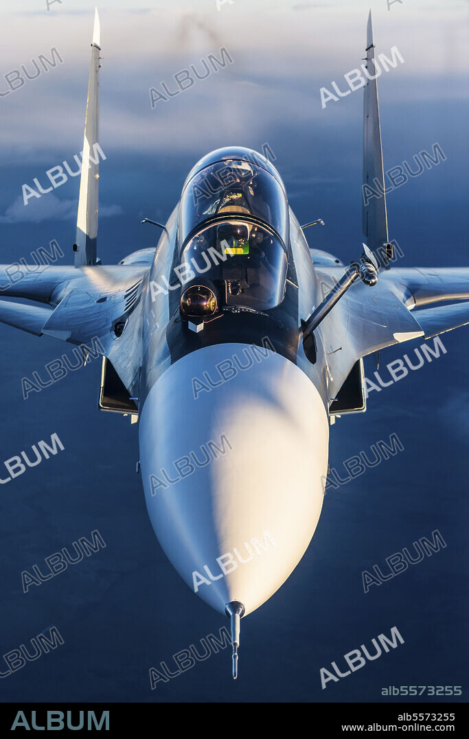 Sukhoi Su-30SM jet fighter of the Russian Navy flying behind a refueling tanker, Kaliningrad Region, Russia.