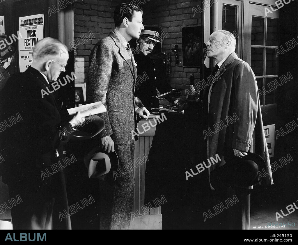 EDMUND GWENN y JOEL MCCREA en ENVIADO ESPECIAL, 1940 (FOREIGN CORRESPONDENT), dirigida por ALFRED HITCHCOCK. Copyright UNITED ARTISTS.