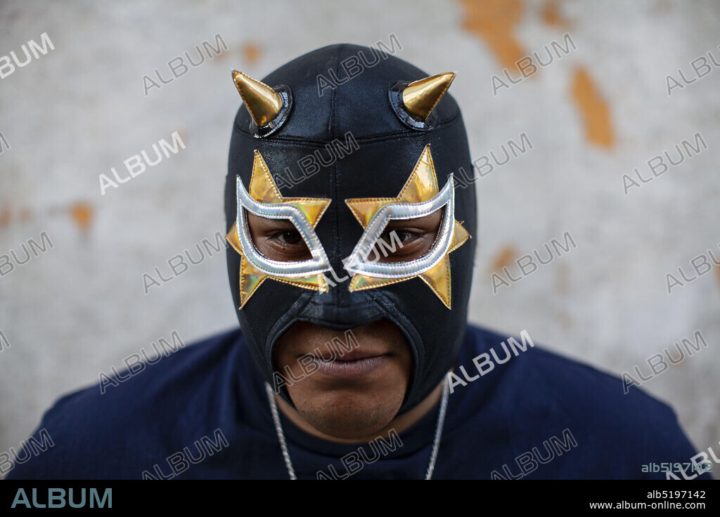 November 26, 2020, Xochimilco, Mexico City, Mexico: Luchadores wrestler MISTER JERRY wearing his mask at the family home. (Credit Image: © Michael McElroy/ZUMA Wire).