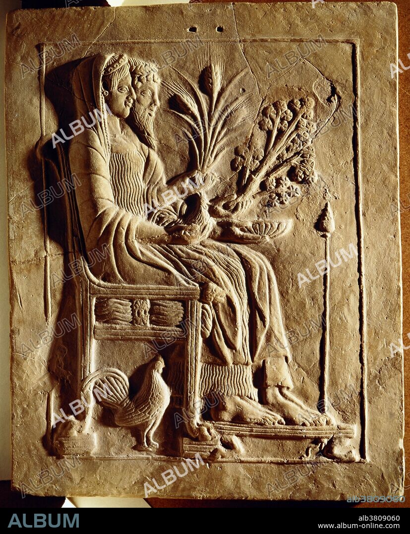 Pinax (a votive tablet of painted wood or carved terracotta, marble or bronze) of Persephone and Hades on the throne, with votive offerins in their hands, from 480 BC. Found in the holy shrine of Persephone at Locri in the district Mannella. Locri was part of Magna Graecia and is situated on the coast of the Ionian Sea in Calabria in Italy.