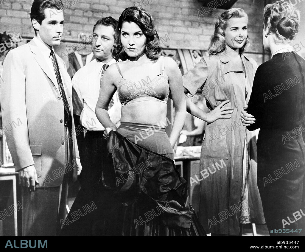 GIA SCALA and KERWIN MATHEWS in THE GARMENT JUNGLE, 1957, directed by VINCENT SHERMAN. Copyright COLUMBIA PICTURES.