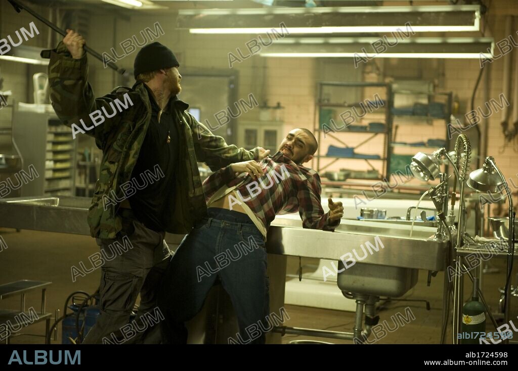 DASH MIHOK and E. J. BONILLA in THE MORTICIAN, 2011, directed by GARETH MAXWELL ROBERTS. Copyright BELLADONNA PRODUCTIONS.