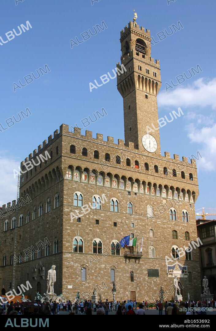 The Palazzo Vecchio is the town hall of Florence, Italy. Romanesque, crenulated fortress-palace overlooking the Piazza della Signoria with its copy of Michelangelo's David statue as well the gallery of statues in the adjacent Loggia dei Lanzi.