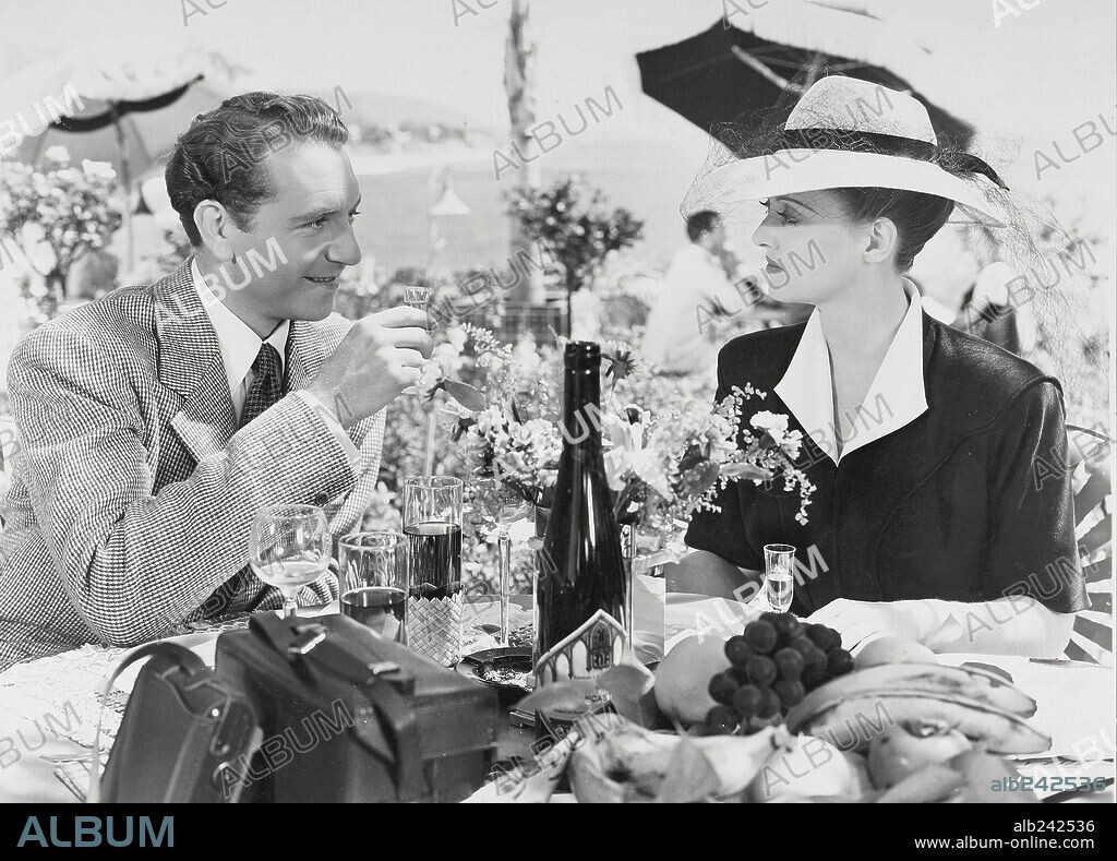 BETTE DAVIS und PAUL HENREID in NOW, VOYAGER, 1942, unter der Regie von IRVING RAPPER. Copyright WARNER BROTHERS.
