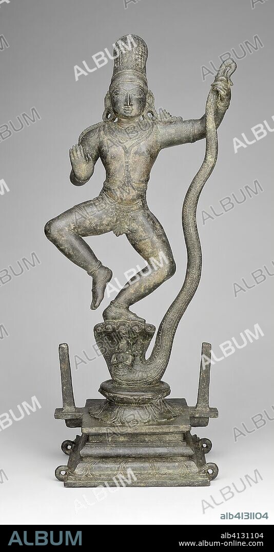 God Krishna Dancing on the Head of the Snake Demon Kaliya (Kaliyadamana). India; Tamil Nadu. Date: 1301-1400. Dimensions: 67.5 × 28.6 × 21.7 cm (26 9/16 × 11 1/4 × 8 9/16 in.). Bronze. Origin: Tamil Nadu.