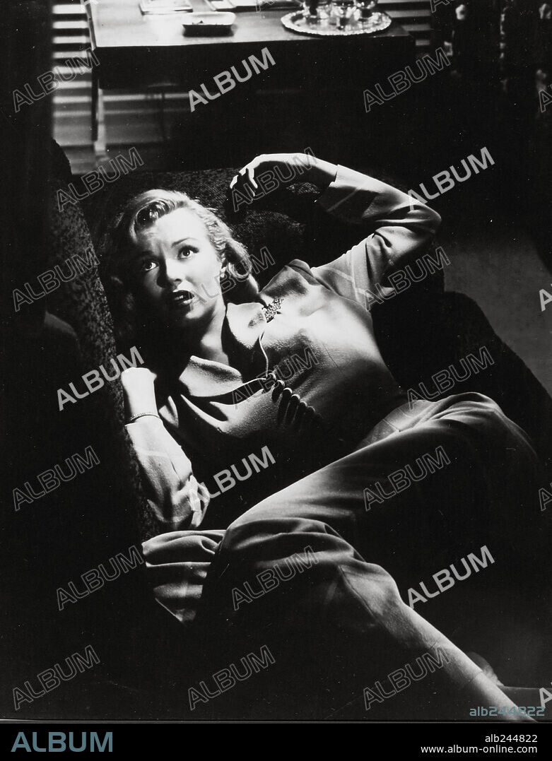 NORMA JEAN BAKER. MARILYN MONROE in THE ASPHALT JUNGLE, 1950, directed by JOHN HUSTON. Copyright M.G.M.