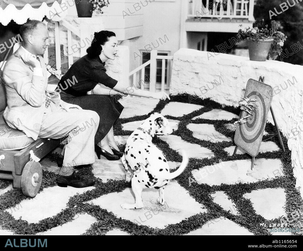 JOHN FARROW and MAUREEN O'SULLIVAN.