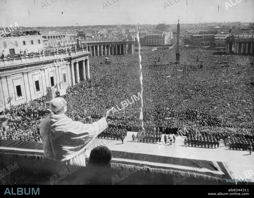Pope Addresses Easter Sunday GatherPope Pius (foreground, Back to camera) stands on the central, balcony of St.Peter's Church and addresses a 400,000 capacity crowd in St.Peter's square on Eater Sunday, March 28, 1948. April 20, 1948. (Photo by Associated Press Photo).