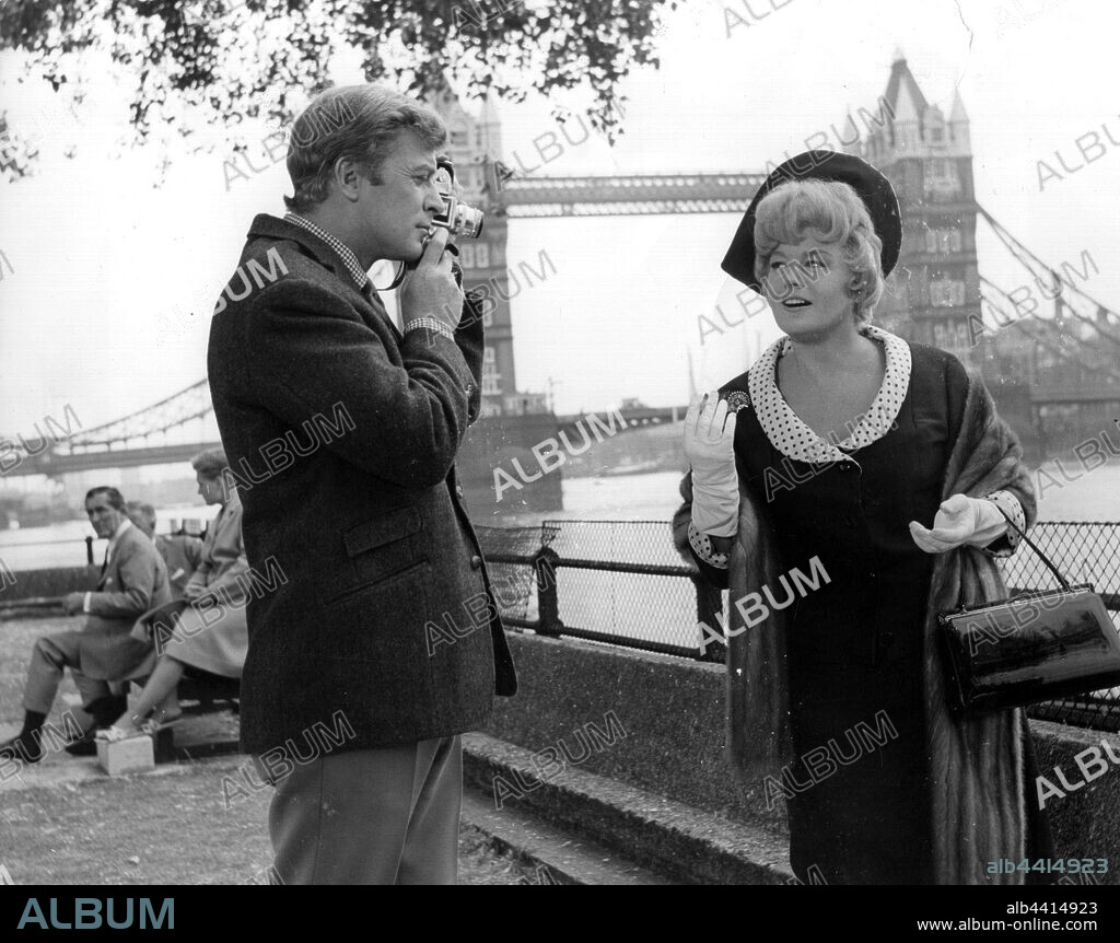 MICHAEL CAINE and SHIRLEY SCHRIFT. MICHAEL CAINE and SHELLEY WINTERS in ALFIE, 1966, directed by LEWIS GILBERT. Copyright PARAMOUNT PICTURES.