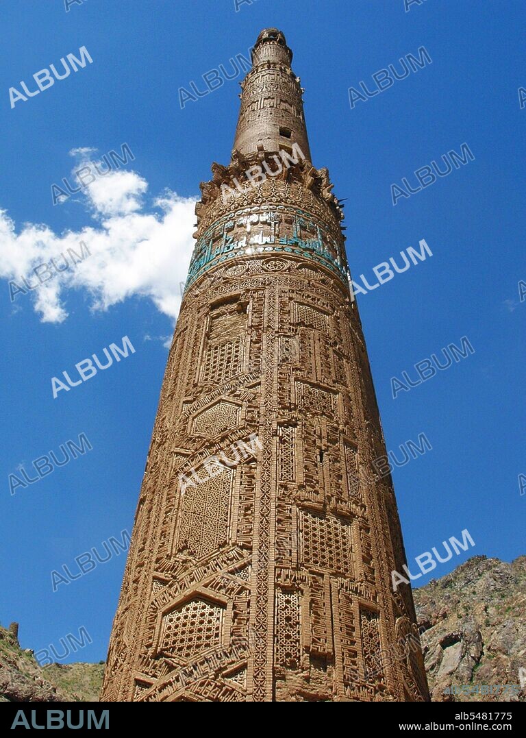 The Minaret of Jam is a UNESCO World Heritage Site in western Afghanistan. It is located in the Shahrak District, Ghor Province, by the Hari River. The 65-metre high minaret, surrounded by mountains that reach up to 2400m, was built in the 1190s, entirely of baked-bricks. It is famous for its intricate brick, stucco and glazed tile decoration, which consists of alternating bands of kufic and naskhi calligraphy, geometric patterns, and verses from the Qur'an (the surat Maryam, relating to Mary, the mother of Jesus). For centuries, the Minaret was forgotten by the outside world until rediscovered in 1886 by Sir Thomas Holdich, who was working for the Afghan Boundary Commission. It did not come to world attention, however, until 1957 through the work of the French archaeologists André Maricq and Gaston Wiet. Later, Werner Herberg conducted limited surveys around the site in the 1970s, before the Soviet invasion of 1979 once again cut off outside access. The archaeological site of Jam was successfully nominated as Afghanistan's first World Heritage site in 2002. It was also inscribed in UNESCO's list of World Heritage in Danger, due to the precarious state of preservation of the minaret, and results of looting at the site. The circular minaret rests on an octagonal base; it had 2 wooden balconies and was topped by a lantern. It is thought to have been a direct inspiration for the Qutub Minar in Delhi, which was also built by the Ghurid Dynasty. After the Qutub Minar in Delhi, India, which it inspired, the Minaret of Jam is the second-tallest brick minaret in the world. The Minaret of Jam belongs to a group of around 60 minarets and towers built between the 11th and the 13th centuries in Central Asia, Iran and Afghanistan, ranging from the Kutlug Timur Minaret in Old Urgench (long considered the tallest of these still in existence) to the tower at Ghazni. The minarets are thought to have been built as symbols of Islam's victory, while other towers were simply landmarks or watchtowers.