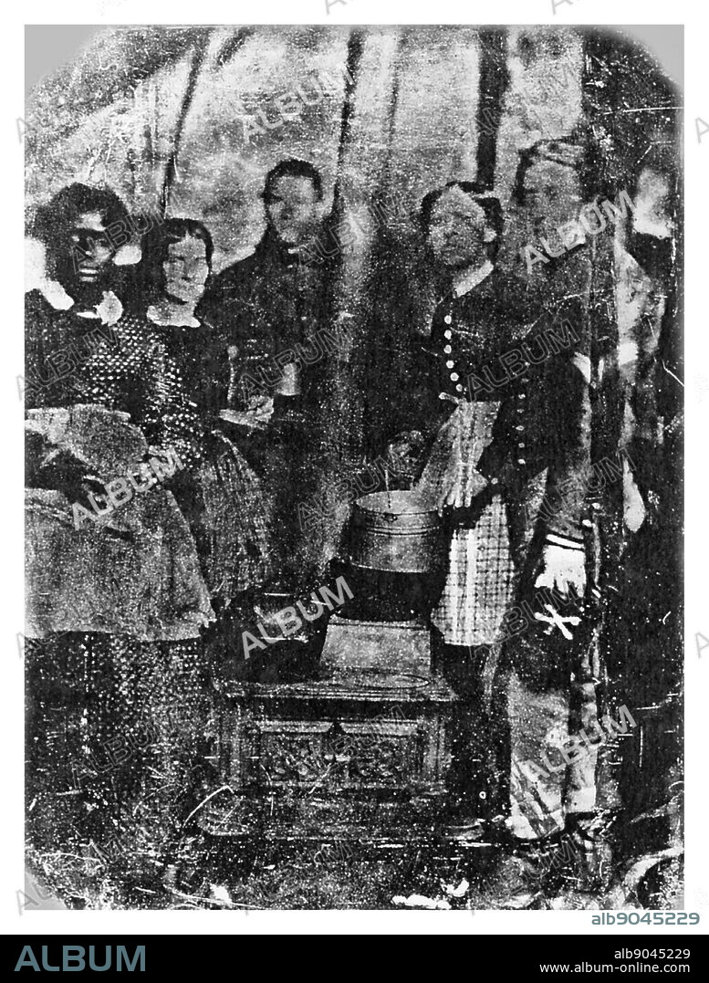 Nurses, attendants, and soldiers inside a hospital tent at City Point, Virginia 1864.