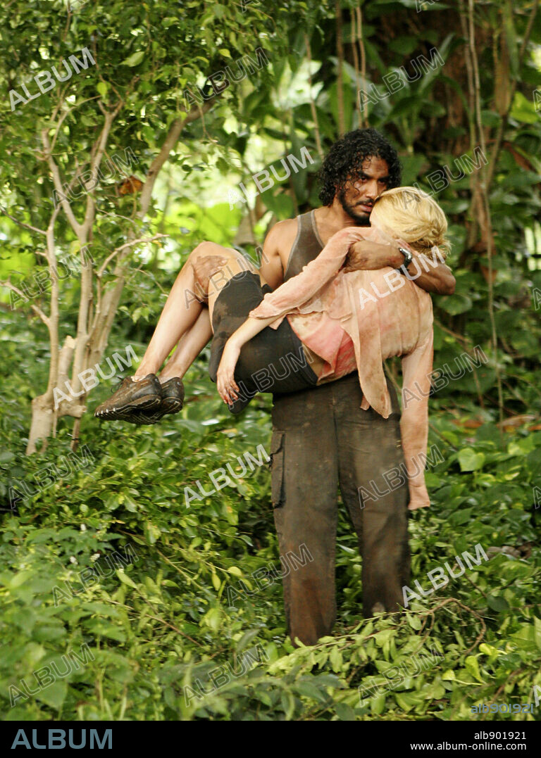MAGGIE GRACE and NAVEEN ANDREWS in LOST, 2004. Copyright ABC / PEREZ, MARIO.