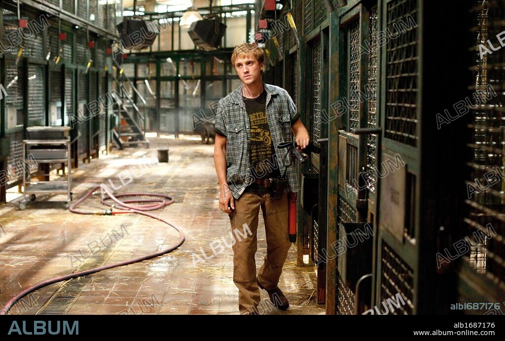TOM FELTON in RISE OF THE PLANET OF THE APES, 2011, directed by RUPERT WYATT. Copyright 20TH CENTURY FOX.