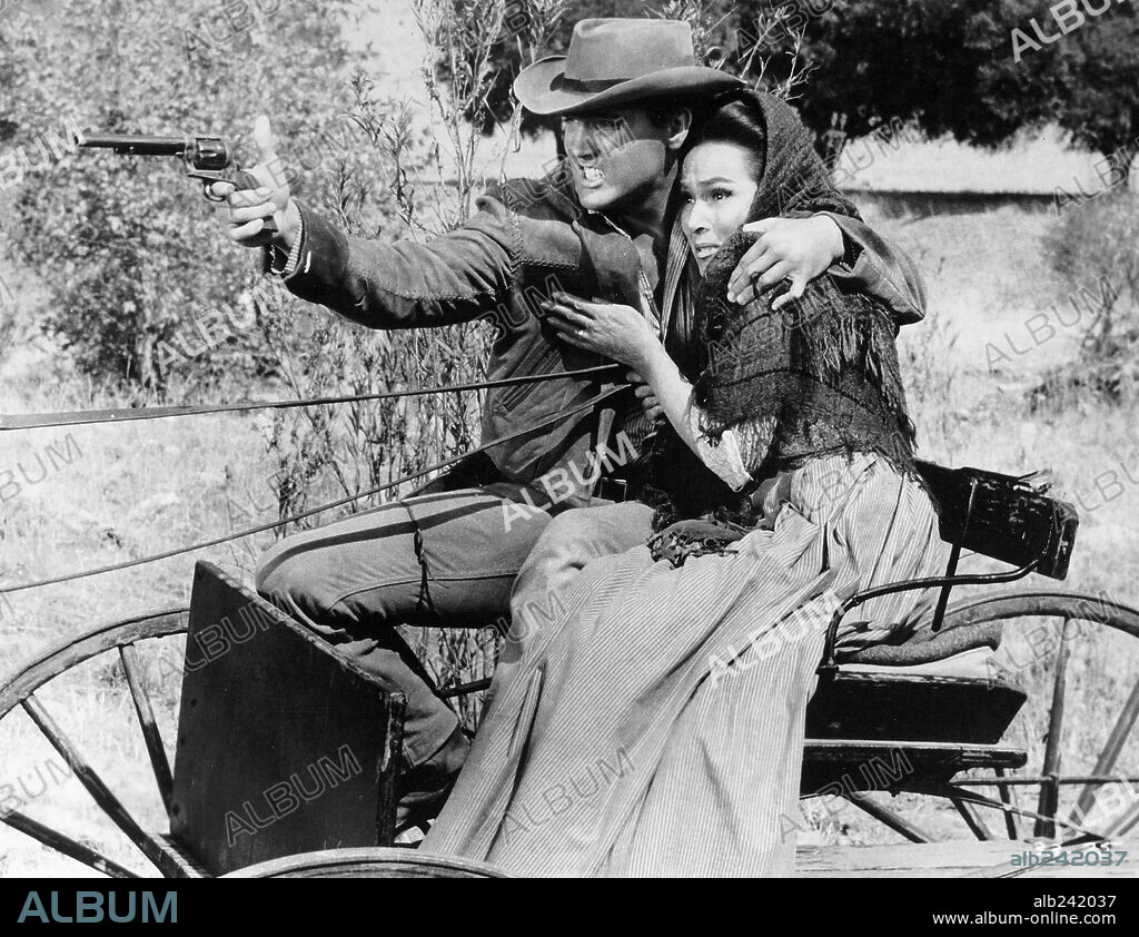 DOLORES DEL RIO and ELVIS PRESLEY in FLAMING STAR, 1960, directed by DON SIEGEL. Copyright 20TH CENTURY FOX.