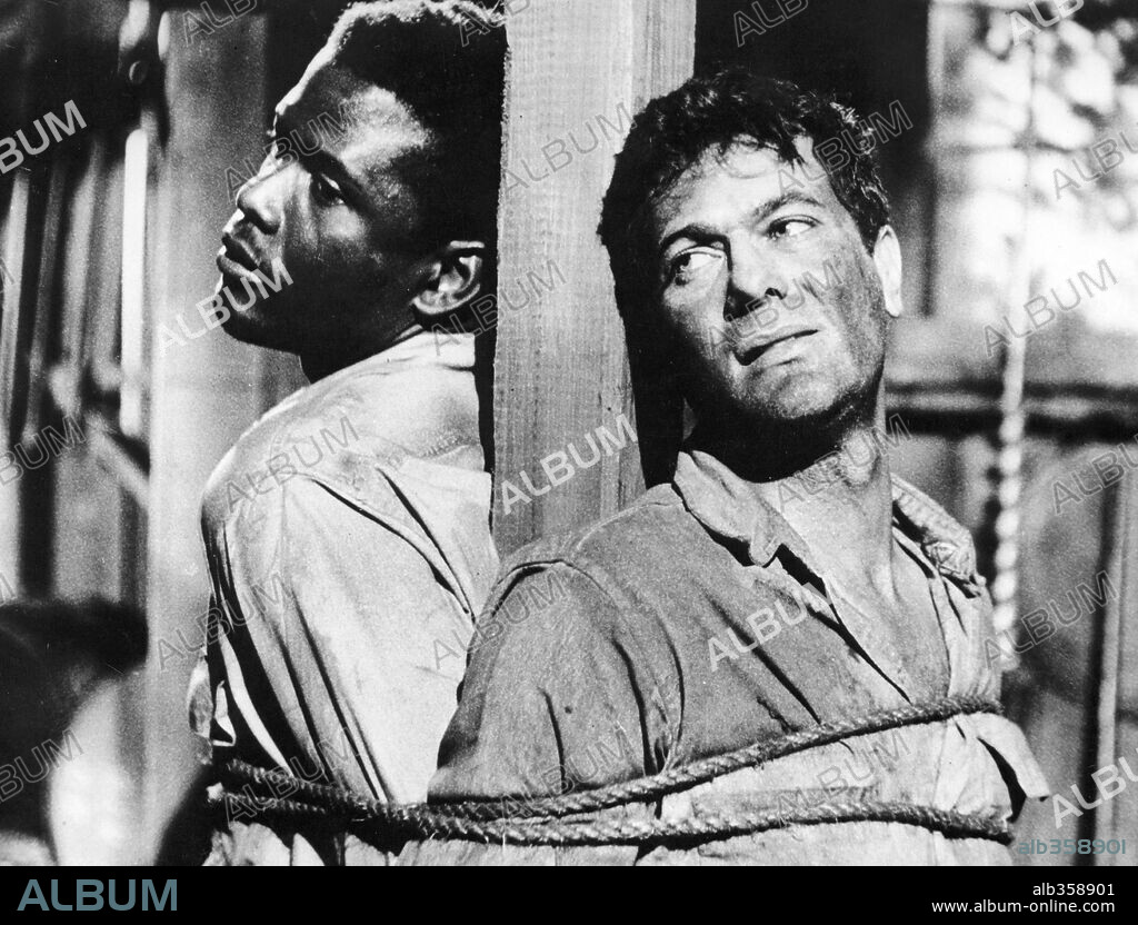 SIDNEY POITIER y TONY CURTIS en FUGITIVOS, 1958 (THE DEFIANT ONES), dirigida por STANLEY KRAMER. Copyright CURTLEIGH PRODUCTIONS.