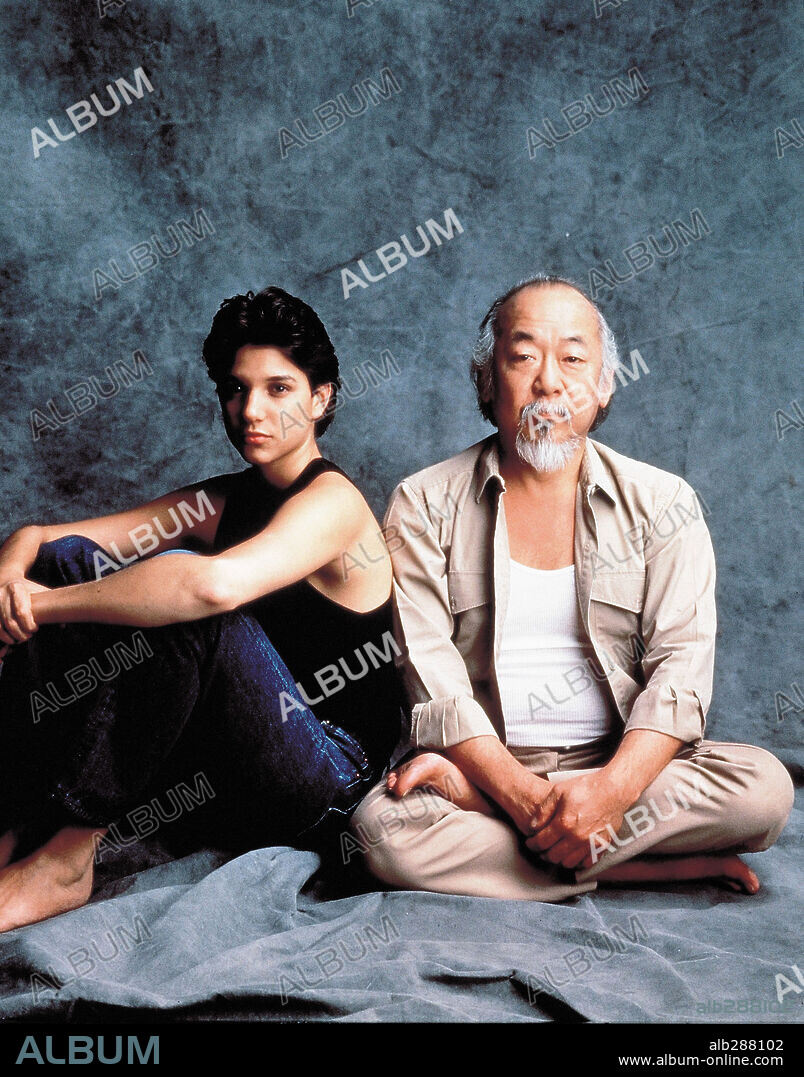 PAT MORITA and RALPH MACCHIO in THE KARATE KID, 1984, directed by JOHN G. AVILDSEN. Copyright COLUMBIA PICTURES.