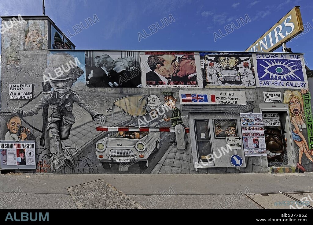 Part of the "East Side Gallery", piece of the Berlin Wall painted after the Fall of the Berlin Wall, Berlin, Germany, Europe.