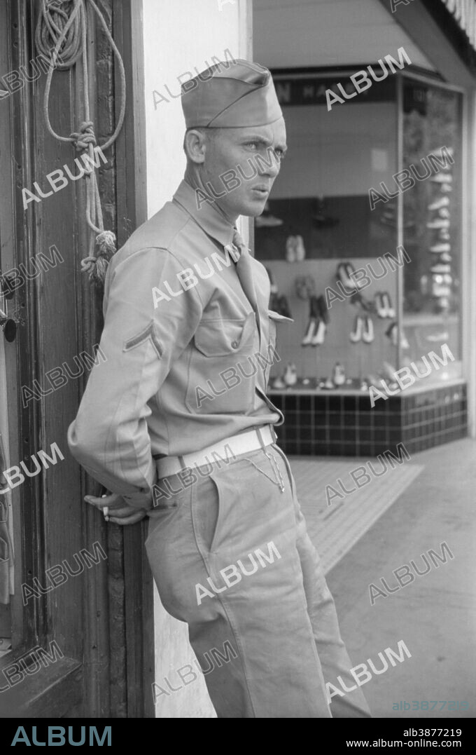 May 1941 - Soldier from Fort Benning on a street in Columbus, Georgia.