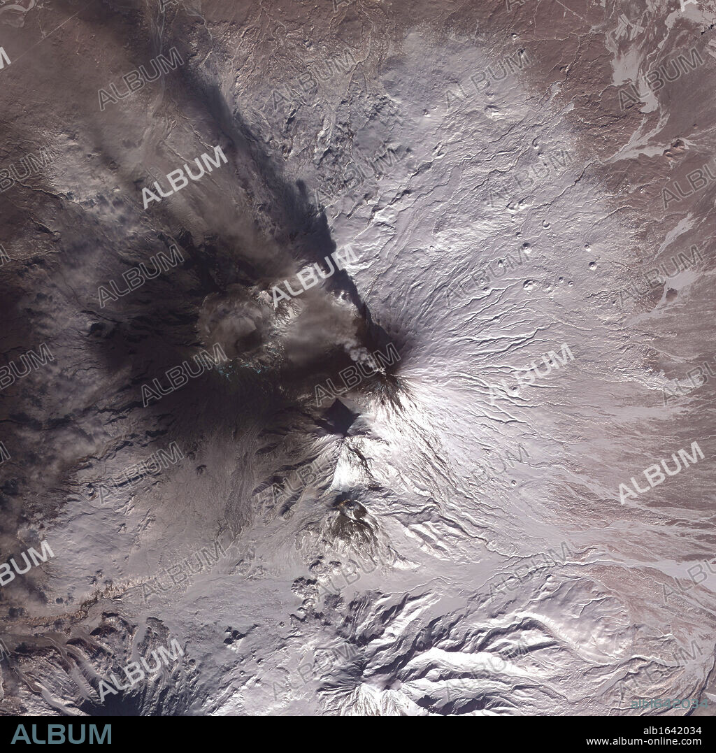 Satellite image of eruption of Kliuchevskoi or Klyuchevskaya Sopka volcano, Kamchatka Peninsula, Russia, 2010. Has been active almost continuously since its first recorded eruption in 1697. Credit NASA. Science Geology Vulcanology.