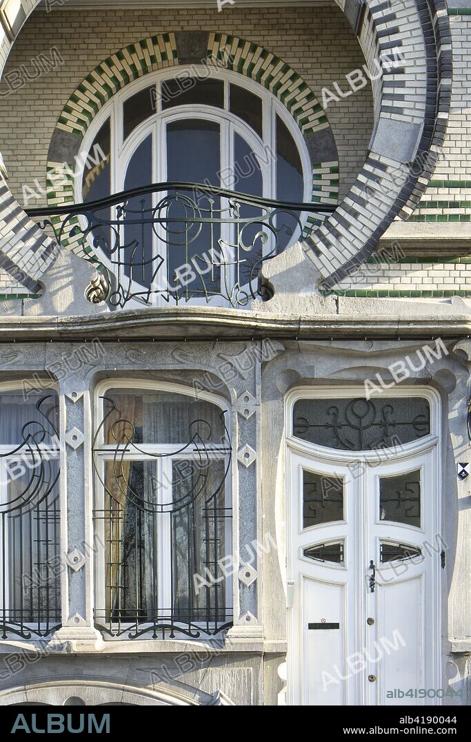 Maison Nelissen, 5 Avenue du Mont Kemmel, Brussels, c2014-c2017. Designed by Arthur Nelissen: 1905. Personal home of the architect Arthur Nelissen, also known as Villa Beau-Site. Geometric Art Nouveau in blue stone with glazed bricks and  loggia horseshoe arch.