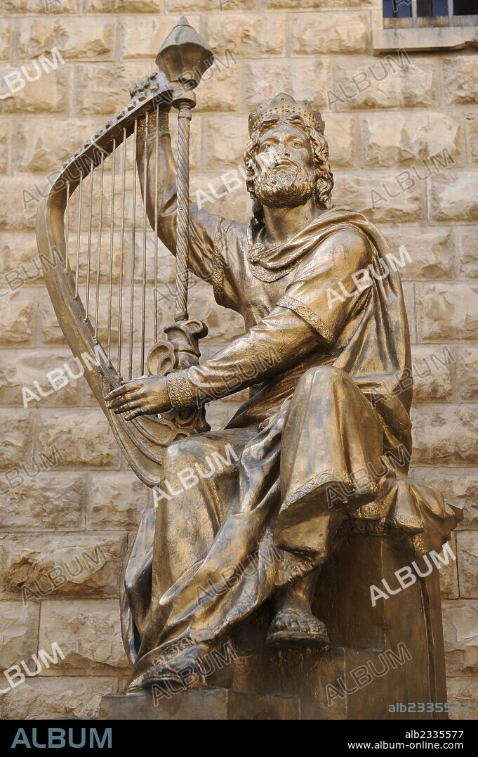 King David of Israel (C. 1040-970 BC) playing the harp. Statue located near the entrance to the king David's tomb. Mount Zion. Jerusalem. Israel.