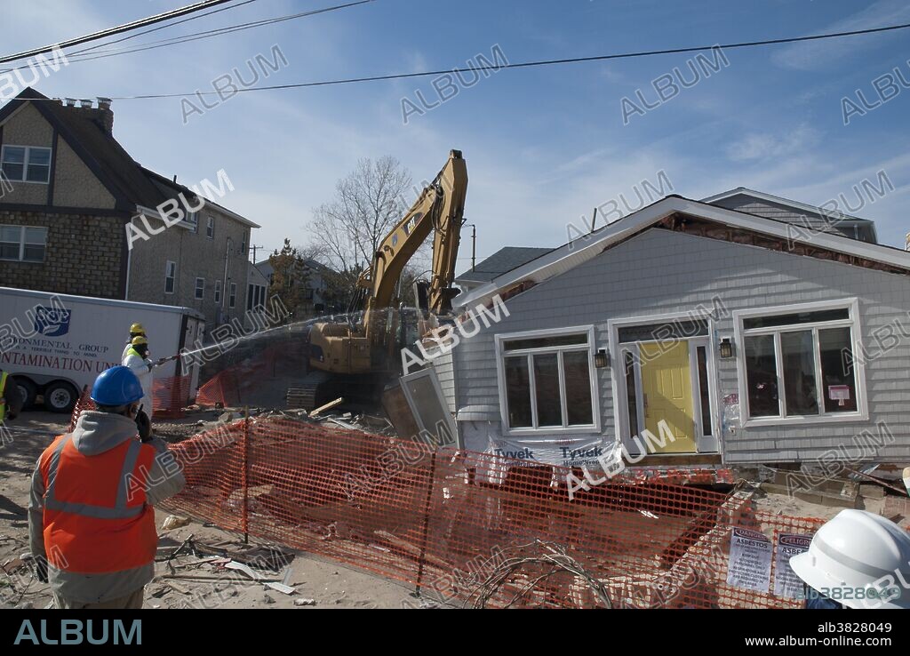 Hurricane Sandy Aftermath. Demolition of damaged house. Breezy Pt. Queens, NY.