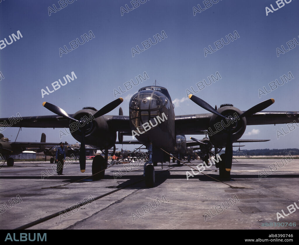 ALFRED T PALMER. B-25 bombers on the outdoor assembly line at North American Aviation, Incorporated, almost ready for their first test flight, Kansas City, Kansas.
