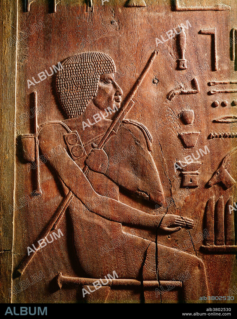 A wooden relief depicting the Ancient Egyptian physician and scribe, Hesy-ra or Hesire (Third Dynasty) in the Egyptian Museum in Cairo, Egypt.