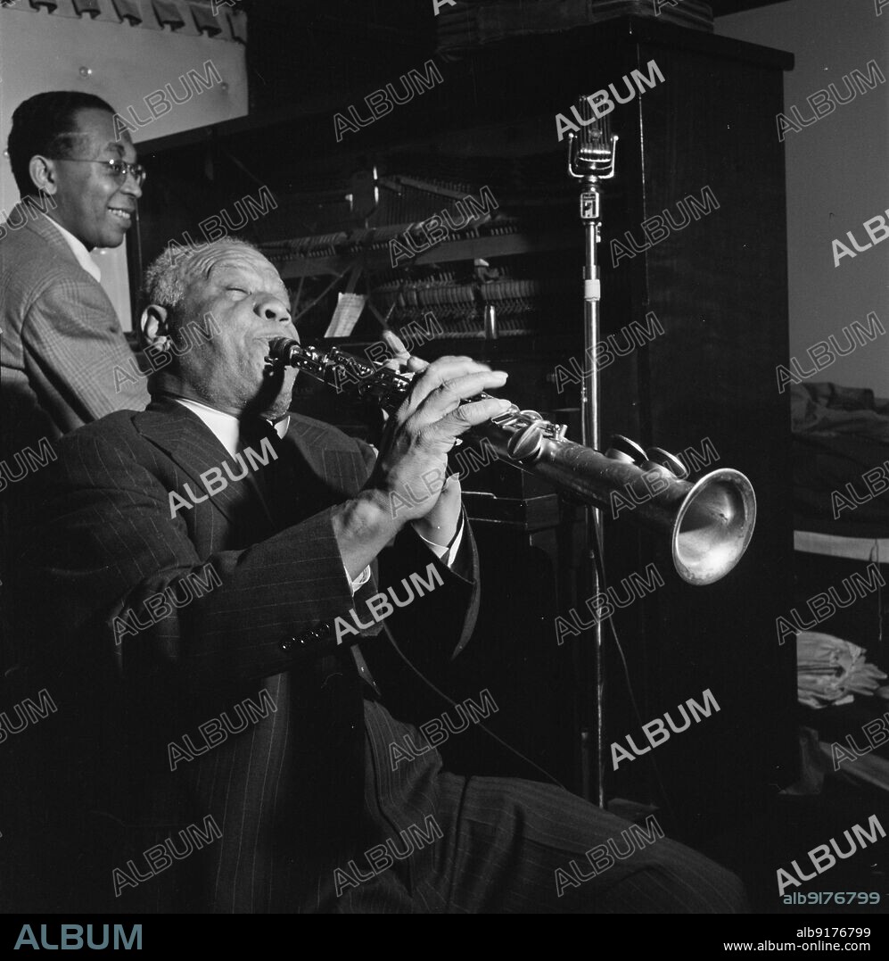 WILLIAM PAUL GOTTLIEB. Portrait of Sidney Bechet and Lloyd Phillips, Jimmy Ryan's (Club), New York, N.Y., ca. June 1947.
