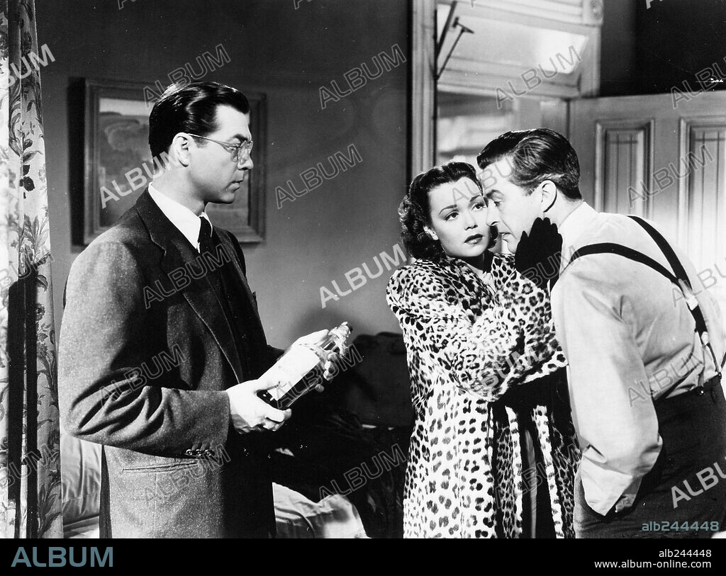 JANE WYMAN, PHILLIP TERRY and RAY MILLAND in THE LOST WEEKEND, 1945, directed by BILLY WILDER. Copyright PARAMOUNT PICTURES.
