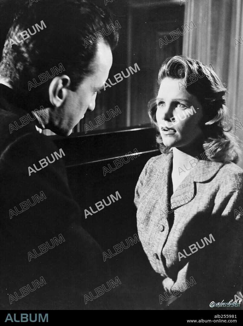 GEORGE C. SCOTT and LEE REMICK in ANATOMY OF A MURDER, 1959, directed by OTTO PREMINGER. Copyright COLUMBIA PICTURES.