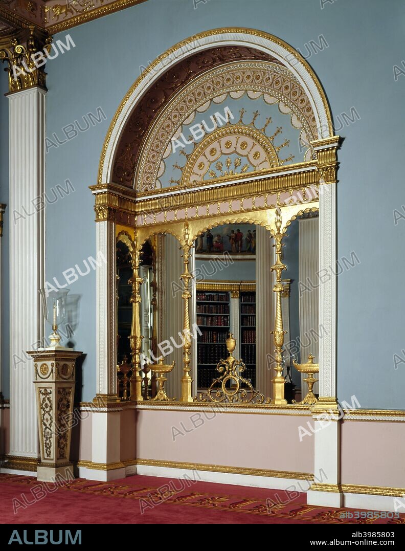 The library, Kenwood House, Hampstead, London, 1995. A detail of a mirrored recess in the Library at Kenwood House. The arch-shaped alcove is richly decorated in gold with ornate designs. The library is one of the finest Robert Adam rooms in existence. In 1969, the book-cases which had been placed in the arched recess shown here, were removed and replaced by triple mirrors to Adam's original design.