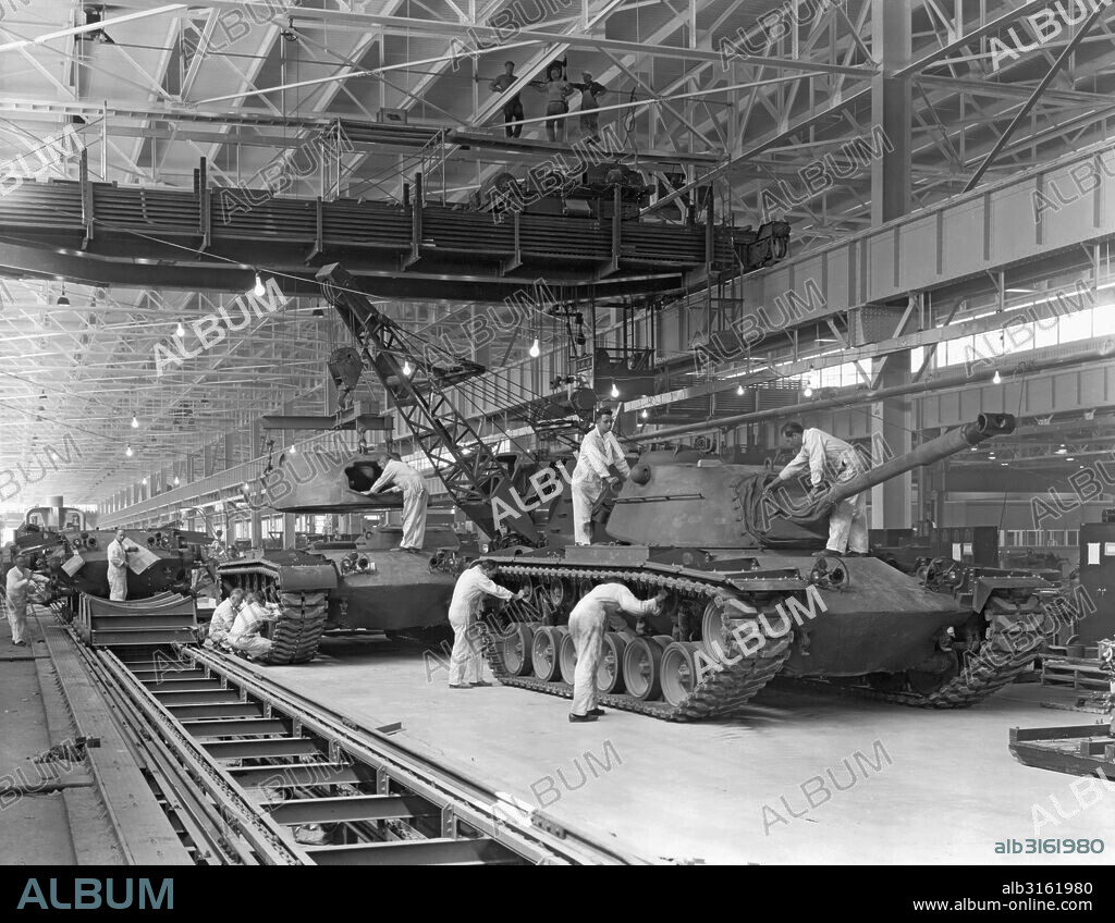 Livonia, Michigan: 1952. Patton 48 tanks coming down the assembly line at the Livonia Ford plant.